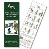The Dog Training Anniversary Calendar by CountrysideGreetings features Bryn Parry’s gundog training cartoons—a trainer awarding medals to dogs in graduation caps, with playful illustrations and detailed calendar info on the reverse.