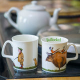 shooting mug featuring bryn parry bullocks cartoon. A bull with pheasants on standing behind a man in tweeds and and a yellow labrador