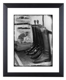 The Hunting limited edition print Huntsmans Boots by Charles Sainsbury-Plaice from Countryside Greetings features two pairs of riding boots with boot trees beside folded clothes—perfect for sporting interiors or collectors.