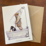 The Shooting Greeting Card – Shooting Practice by Bryn Parry from Countryside Greetings features a man in outdoor gear hunting from a bathtub, with a dog and toy duck under the shower. Envelope included for your thank you notes.