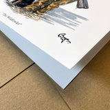A close-up of Countryside Greetings’ “Shooting Greeting Card: The Wildfowler by Bryn Parry,” featuring part of the illustration and artist’s signature on thick white sustainable card, placed on a brown cardboard surface.