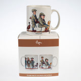 The Shooting Mug. Fun Shoot, Serious Shoot by Bryn Parry from CountrysideGreetings is a dishwasher-safe ceramic mug featuring two men in plaid, one with a rifle and another with a dog, and comes boxed with matching illustrations.