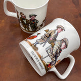 A CountrysideGreetings Bone China Shooting Mug features Bryn Parrys Serious Shoot Fun Shoot cartoon of hunters in traditional attire and a pheasant.