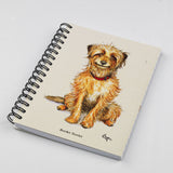 The Cartoon dog themed A6 lined notebook from Countryside Greetings features Bryn Parry’s illustration of a Border Terrier in a red collar with “Border Terrier” below, spiral-bound for convenience.
