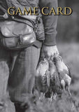 A person outdoors holds game birds by their feet, wearing outdoor attire. Shoot Game Cards appears at the top in gold—French Partridge by Charles Sainsbury-Plaice, from Countryside Greetings—with shoot safety and species info.