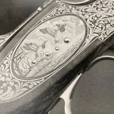 Sporting limited edition signed print by Charles Sainsbury-Plaice for Countryside Greetings, featuring a detailed Beretta Shotgun engraving with two ducks flying over a field, clouds, ornate floral patterns, and raised metal beads.
