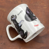The CountrysideGreetings Express Your Love Labrador Mug features Bryn Parry’s playful Black Labradors with “Hungry” and “Loyal” labels, crafted from exquisite bone china.