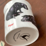 The CountrysideGreetings Express Your Love Labrador Mug features exquisite bone china with Bryn Parry’s illustrations of black Labradors and “Loyal” in red, plus his logo and website on the base.