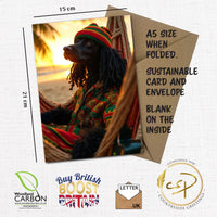 A5 greeting card featuring a Standard Poodle dressed in reggae clothing, sitting in a hammock at sunset. The card is shown with a kraft envelope and labelled with dimensions (15 cm x 21 cm). Text highlights include: A5 size when folded, sustainable card and envelope, blank on the inside. Logos for Woodland Carbon, Buy British Boost Britain, and Countryside Greetings are also shown.