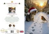 Christmas card cover and back cover for 'Santa Claws Christmas Tales: A Winter Meeting Percy & Robin' shown side by side. The front cover features a cat in a red Santa hat and white beard in the snow, while the back cover includes title text, author information, contributor names, and a barcode.