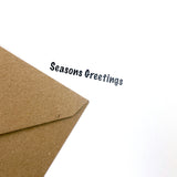 inside of thelwell christmas card and brown fleck envelope